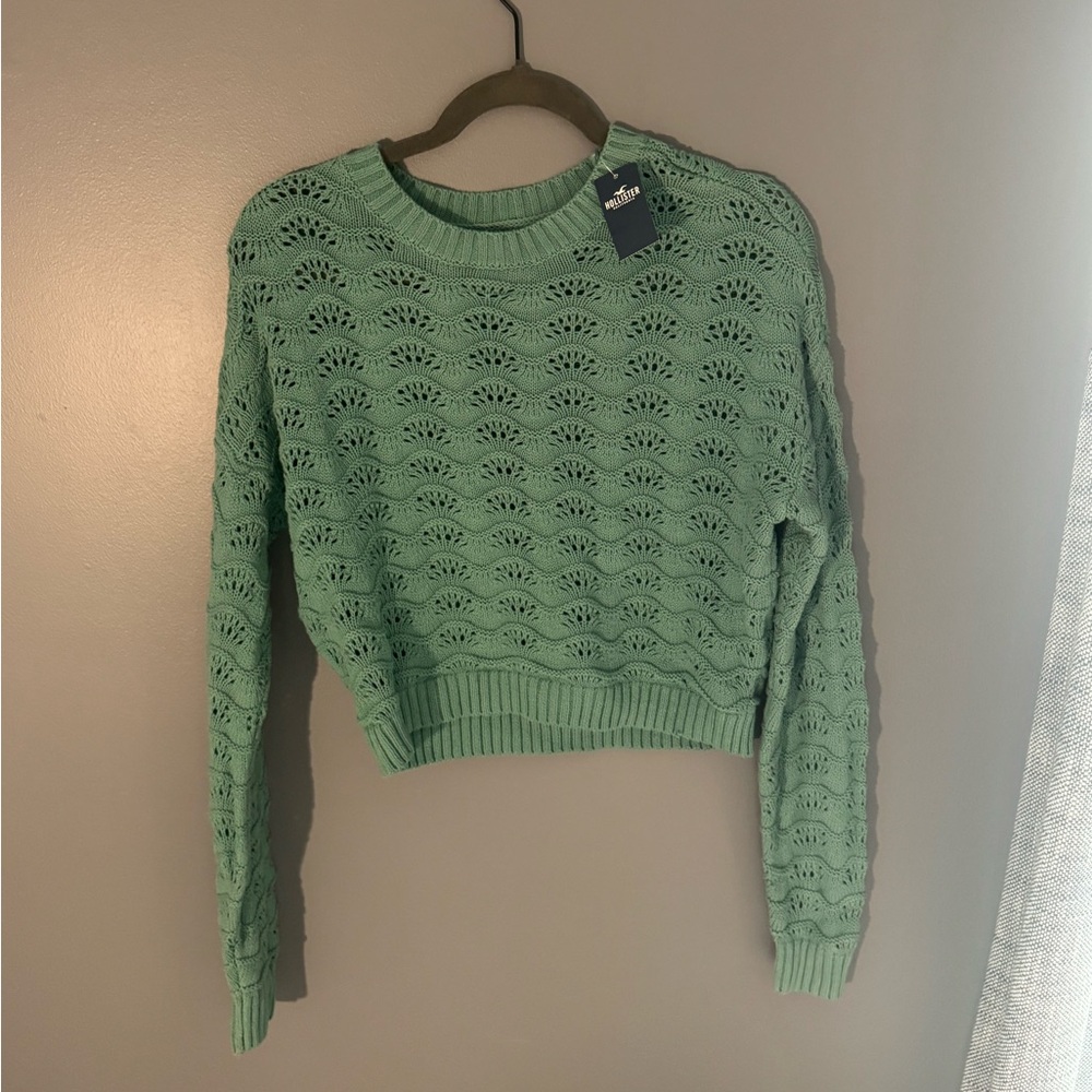 Green Hollister XS sweater with slight crop. New with tags!